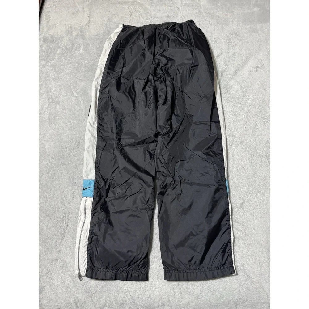 VTG Nike Mens XL Track Pants Windbreaker Black Nylon Ankle Zip Running
